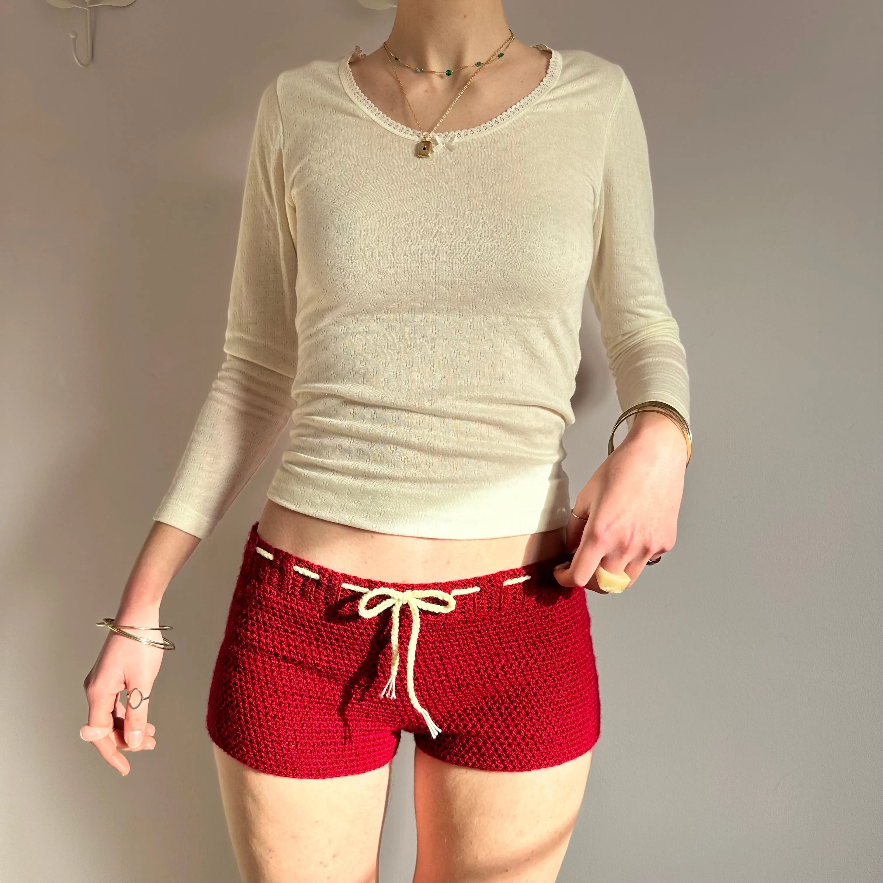 Handmade dark red crochet shorts with cream bow