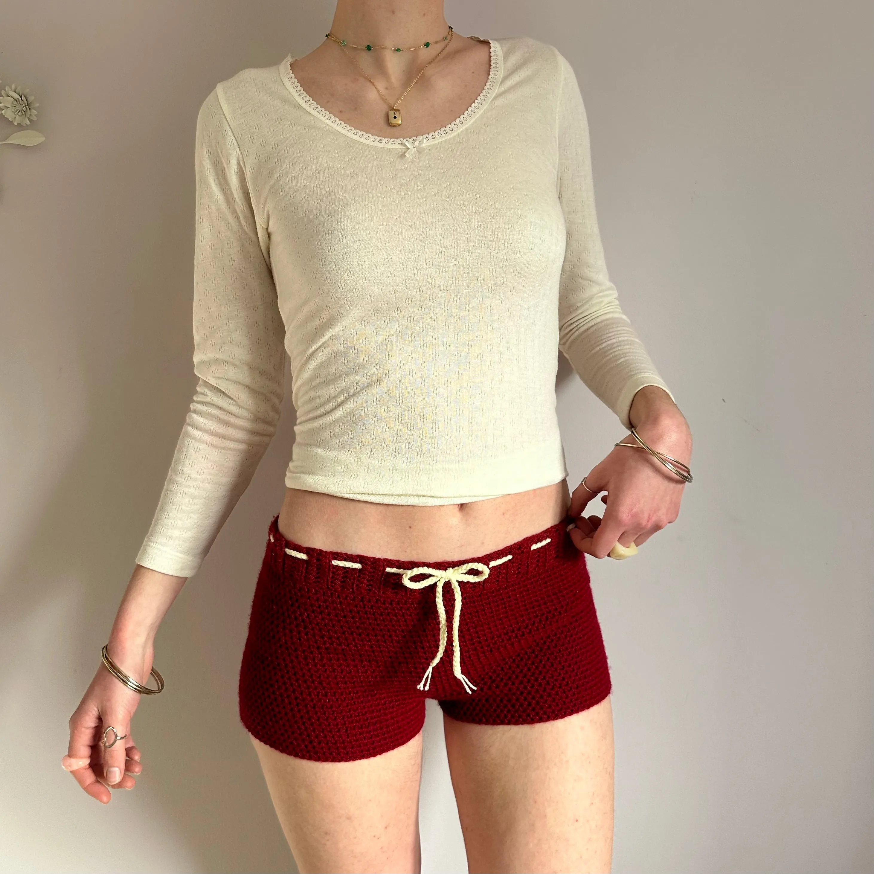 Handmade dark red crochet shorts with cream bow