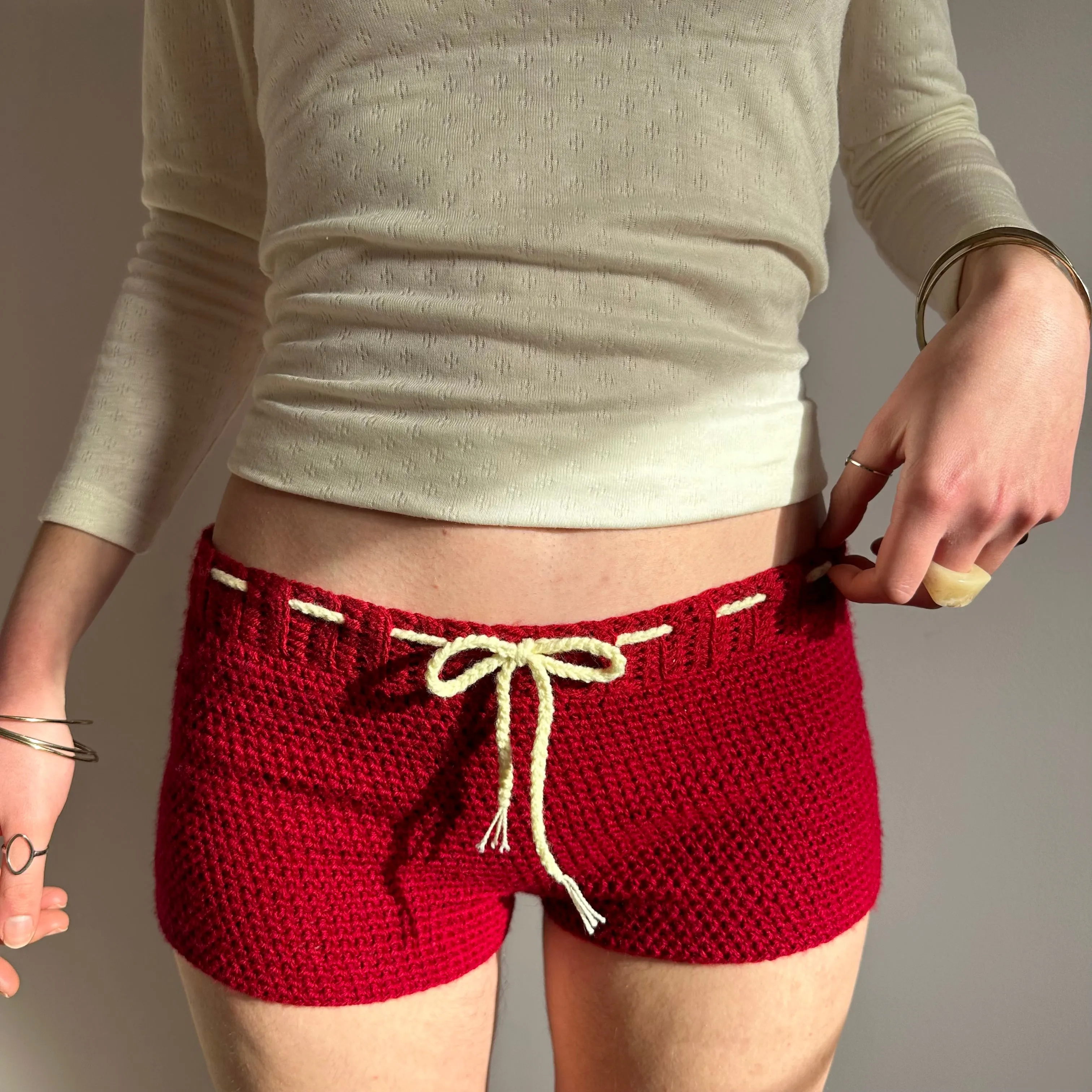 Handmade dark red crochet shorts with cream bow