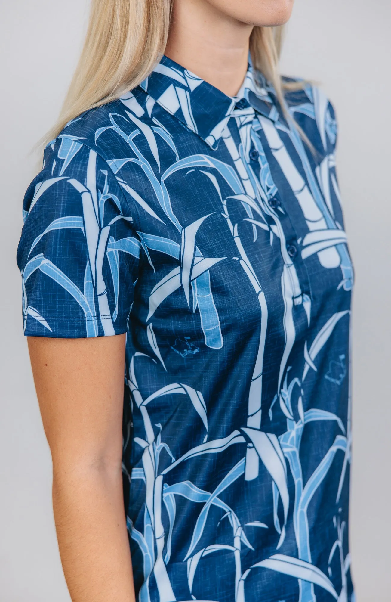 "Sugarcane Indigo Fields"- OGA Women's Polo - Indigo Blue