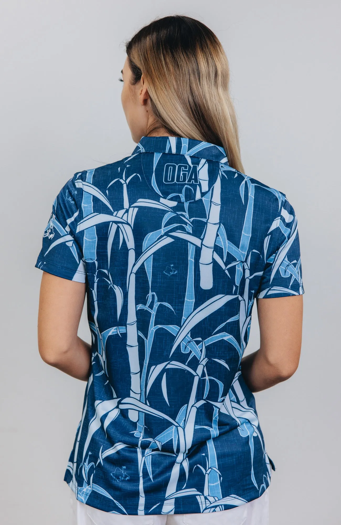 "Sugarcane Indigo Fields"- OGA Women's Polo - Indigo Blue